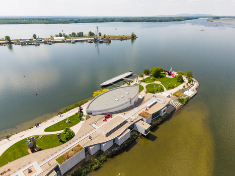 Aerial view of the Danubiana Meulensteen Art Museum on a peninsula in the Danube river with modern sculptures and green lawns Bratislava Bratislavsky kraj Slovakia. Aerial view of the Danubiana Meulensteen Art Museum on a peninsula in the Danube river with modern sculptures and green lawns Bratislava Bratislavsky kraj Slovakia.