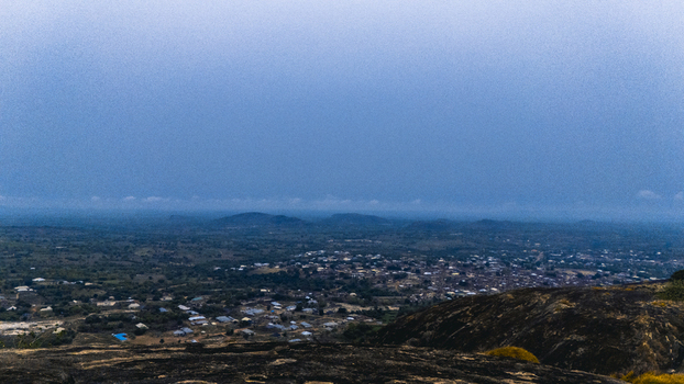 Aerial view of the landscape where the town nestles amid the undulating terrain under a vast sky IYAKE LAKE Oyo Nigeria. Aerial view of the landscape where the town nestles amid the undulating terrain under a vast sky IYAKE LAKE Oyo Nigeria.