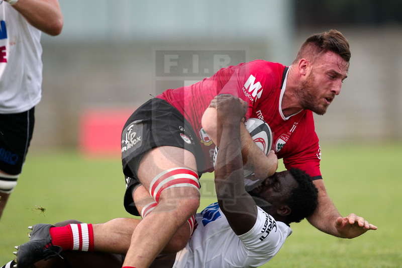 Rugby, Finale Serie A, Piacenza, Stadio Beltrametti, 9/06/2019, SITAV Lyons Piacenza v HSB Rugby Colorno. Diego Del Nevo fermato da Nourou Abdoul Bance. Foto Roberto Bregani/Fotosportit.