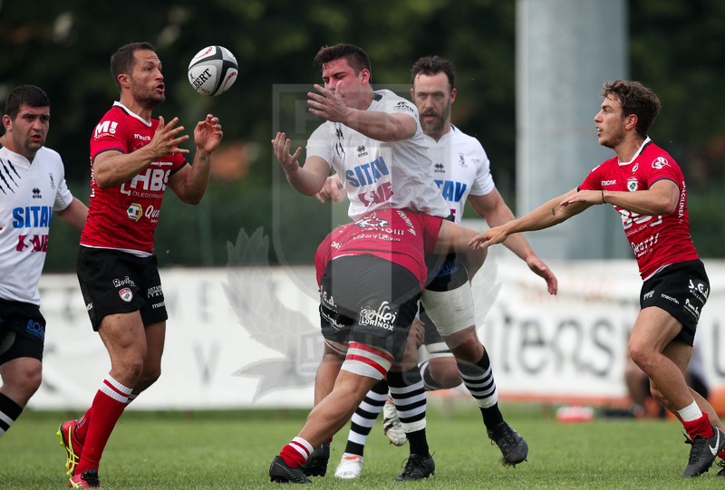 Rugby, Finale Serie A, Piacenza, Stadio Beltrametti, 9/06/2019, SITAV Lyons Piacenza v HSB Rugby Colorno. Off-load di Alberto Rollero sul placaggio di Mattia Modoni. Foto Roberto Bregani/Fotosportit.