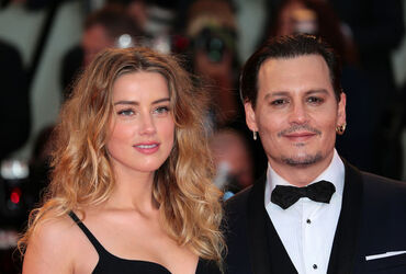 Actor Johnny Depp and actress Amber Heard at the 72nd Venice Film Festival