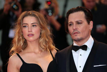 Actor Johnny Depp and actress Amber Heard at the 72nd Venice Film Festival