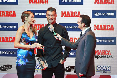 Cristiano Ronaldo jokes with a female TV presenter as he wins Alfredo di Stefano award for La Liga s best player