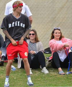 Justin Bieber playing football in a park in Playa Del Rey.