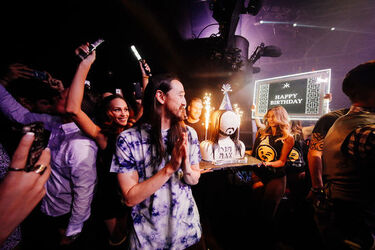 One Direction Member Louis Tomlinson shows off his tattoos as he is spotted at Hakkasan Nightclub