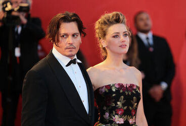 Actor Johnny Depp and actress Amber Heard at the 72nd Venice Film Festival