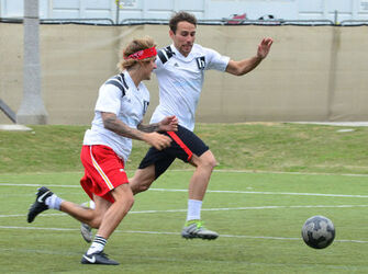 Justin Bieber playing football in a park in Playa Del Rey.