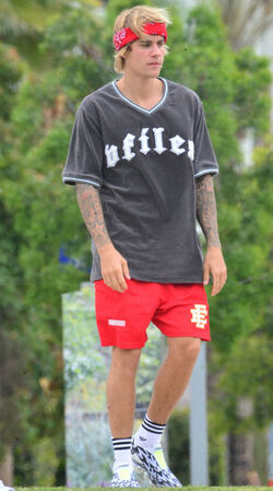 Justin Bieber playing football in a park in Playa Del Rey.