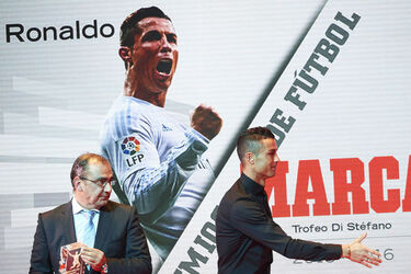 Cristiano Ronaldo jokes with a female TV presenter as he wins Alfredo di Stefano award for La Liga s best player