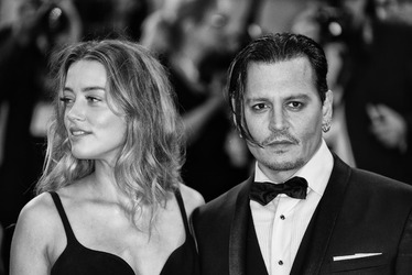 Actress Amber Heard and actor Johnny Depp at the 72nd Venice Film Festival