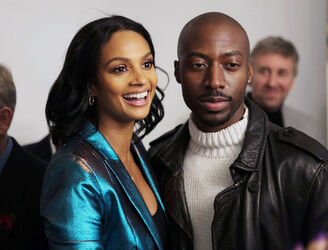 Alesha Dixon fashions a shiny turquoise jacket as she and boyfriend Azuka Ononye support Graduate Fashion Week London