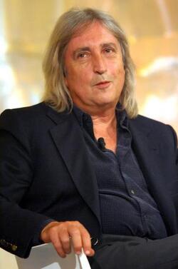 ENRICO VANZINA REGISTA