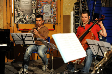 GIACOMO CUTICCHIO e il suo ensemble musicale. Fotografie di Giulio Azzarello &copy;2014.