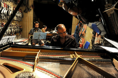 GIACOMO CUTICCHIO e il suo ensemble musicale. Fotografie di Giulio Azzarello &copy;2014.