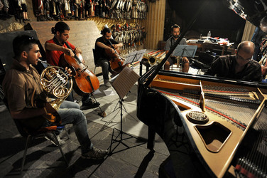 GIACOMO CUTICCHIO e il suo ensemble musicale. Fotografie di Giulio Azzarello &copy;2014.