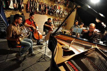 GIACOMO CUTICCHIO e il suo ensemble musicale. Fotografie di Giulio Azzarello &copy;2014.