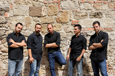 GIACOMO CUTICCHIO e il suo ensemble musicale. Fotografie di Giulio Azzarello &copy;2014.