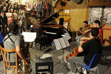 GIACOMO CUTICCHIO e il suo ensemble musicale. Fotografie di Giulio Azzarello &copy;2014.