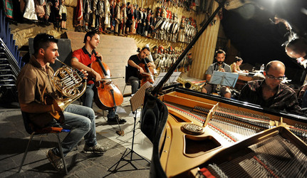 GIACOMO CUTICCHIO e il suo ensemble musicale. Fotografie di Giulio Azzarello &copy;2014.