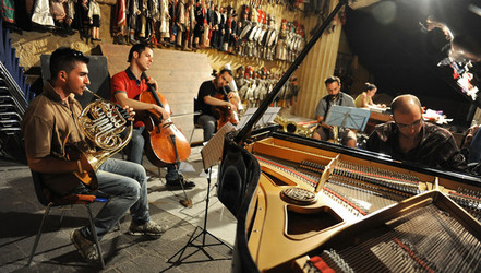 GIACOMO CUTICCHIO e il suo ensemble musicale. Fotografie di Giulio Azzarello &copy;2014.