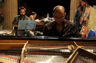 GIACOMO CUTICCHIO e il suo ensemble musicale. Fotografie di Giulio Azzarello &copy;2014.