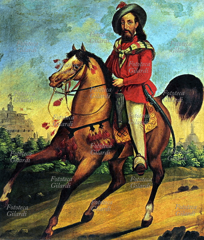 Giuseppe GARIBALDI (1807-82) alla difesa di Roma. Il Generale è ritratto a cavallo ancora abbigliato come negli anni della sua permanenza in Sud America. Olio su tela di anonimo, circa 1851.