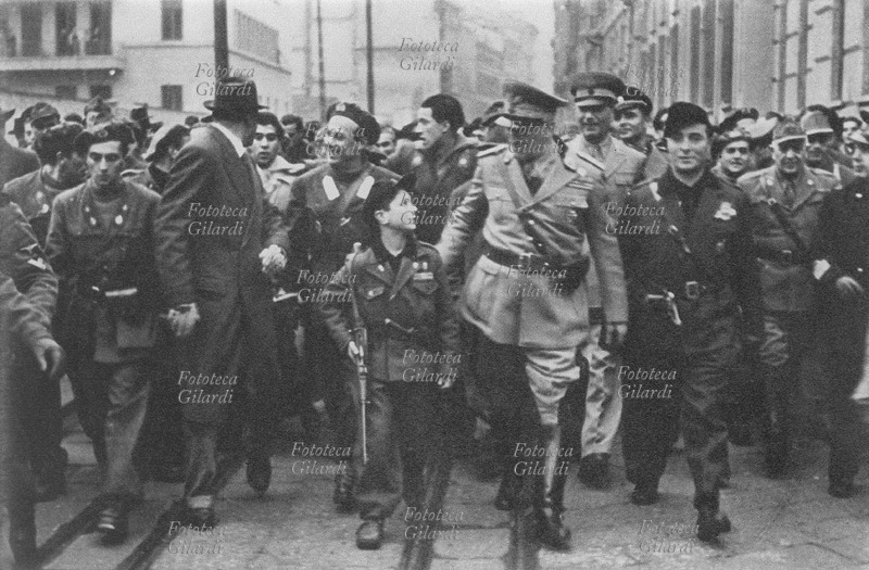 REPUBLIC OF SALÒ Marshal Rodolfo Graziani (11 August 1882 – 11 January 1955), with officers and soldiers of the RSI, talks to a very young \