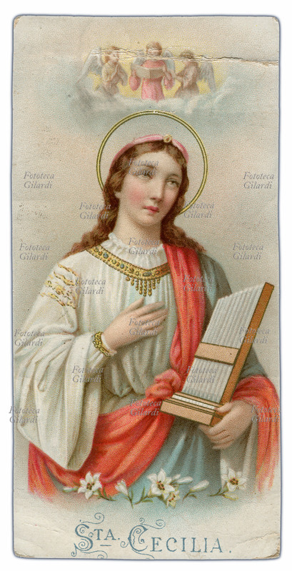 SANTA CECILIA (? - 22 novembre 230) Vergine e Martire. Raffigurazione della Santa con in grembo un piccolo organo, sovrastata da un trio di angeli in coro. Patrona della musica. Festa 22/11. Immaginetta cromolitografica, Italia 1900 circa.