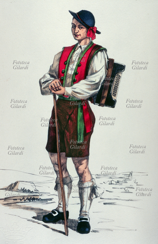 COSIO (Sondrio) costume tradizionale maschile; il giovane uomo porta sulla spalla una fisarmonica. Tavola n. 22 da \