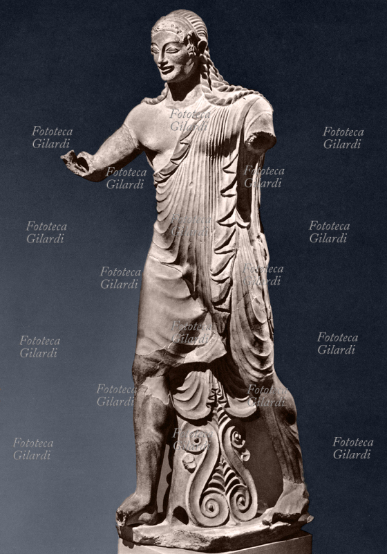 Etruscan statue depicting Apollo, painted terracotta life-size, from Veii. The lack of the arms does not decrease the strength of the movement. Rome, National Etruscan Museum of Villa Giulia, the end of the sixth century BC