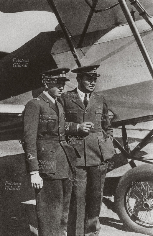 Bruno (22 aprile 1918 – 7 agosto 1941) e Vittorio (27 settembre 1916 – 13 giugno 1997) MUSSOLINI, aviatori italiani, figli secondo e terzogenito del Duce Benito e Rachele Guidi, piloti volontari in Africa Orientale, ritratti in piedi davanti all\