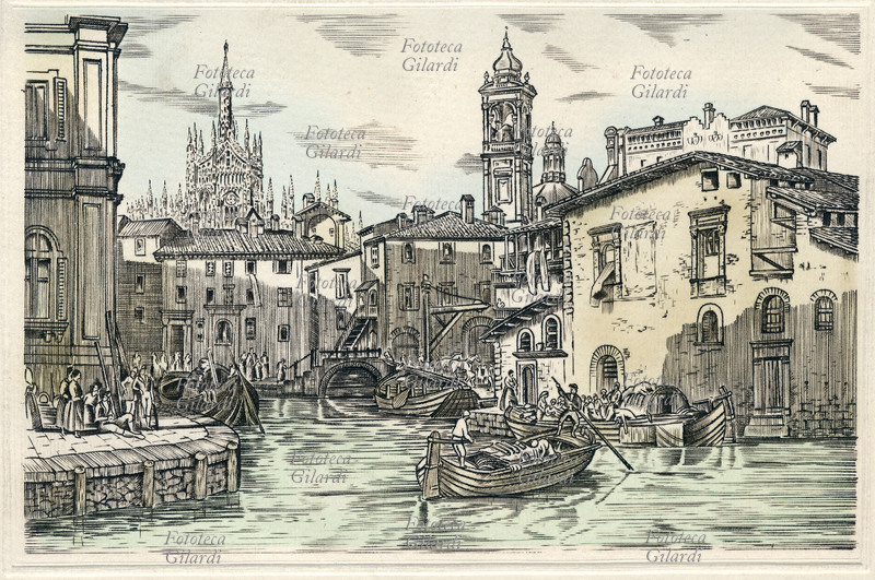 MILANO antica, veduta dei navigli. Dietro le case si vedono le guglie del Duomo, la cattedrale della città. Incisione dell\