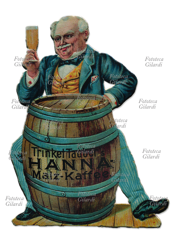 BIRRA Figurina cromolitografica sagomata raffigurante un intenditore di birra che innalza il bicchiere, seduto dietro ad un barile sul quale si legge: Trinket Tauber\
