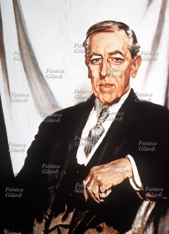 Woodrow WILSON (28 dicembre 1856 – 3 febbraio 1924), politico statunitense, 28º presidente degli Stati Uniti dal 1913 al 1921, ritratto dal pittore irlandese-britannico Sir William Orpen (27 novembre 1878 – 30 settembre 1931), ritrattista ufficiale durante la Conferenza di pace di Parigi del 1919. Wilson fu insignito del Premio Nobel per la pace per il suo contributo ai trattati postbellici. Dipinto, Parigi, 1919.