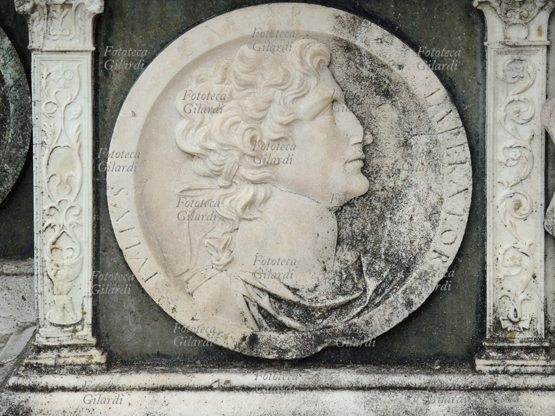 Gaius JULIUS CAESAR (13 July 101 BC or 12 July 100 BC - 15 March 44 BC) military, consul, dictator, pontiff maximum, Roman orator and writer, considered one of the most important and influential characters in history. "Iulius Caesar Imperator", decoration in bas-relief from the band depicting famous characters from antiquity and mythological themes, inspired by medals from the Roman era, carved on the base of the facade of the Certosa di Pavia basilica, a typical example of Lombard Renaissance architecture of the fifteenth century.
