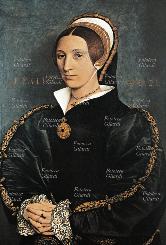 CATERINA HOWARD (1520/15251542) quinta moglie di Enrico VIII. fatta decapitare dal marito dopo poco più di un anno dal matrimonio, secondo una leggenda il suo fantasma vaga nel palazzo di Hampton Court nei pressi di Londra. Stampa dal dipinto di Hans Holbein il Giovane (1497-1543), s.d.