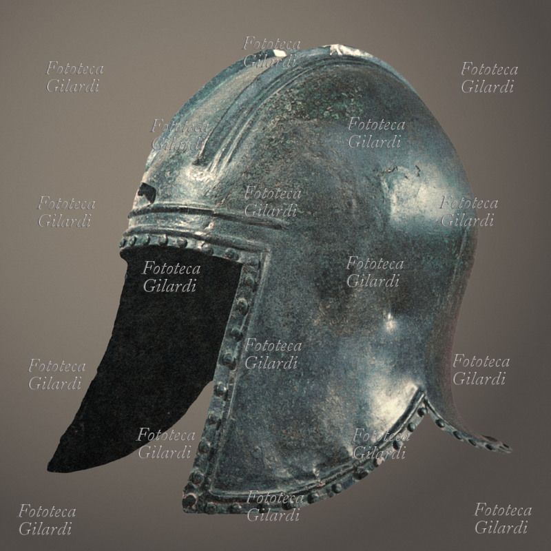ANCIENT GREECE Macedonian helmet in bronze, coming from Lefcadia, V sec. a.C. Tessalonica, Archaeological Museum