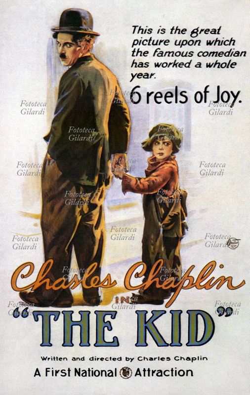 Charles CHAPLIN (16 aprile 1889 - 25 dicembre 1977), "The Kid". Manifesto cinematografico per il film "Il Monello", il primo lungometraggio scritto e diretto da Charlie Chaplin, pubblicizzato con lo slogan "6 bobine di gioia", interpretato da Charlot e Jackie Coogan (26 ottobre 1914 – 1º marzo 1984). Stati Uniti d\