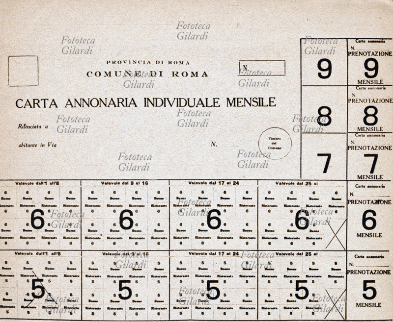 II G.M. ITALIA Una tessera annonaria per il ritiro controllato del cibo in razionamento nei primi anni della guerra. Copia Facsimile. Roma, 1940 circa