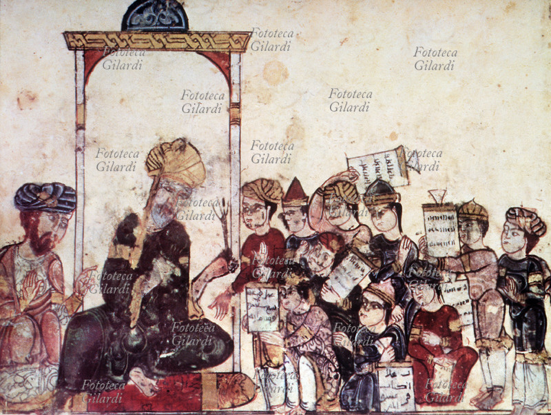 ISLAMISMO Scuola coranica, allievi intorno all\