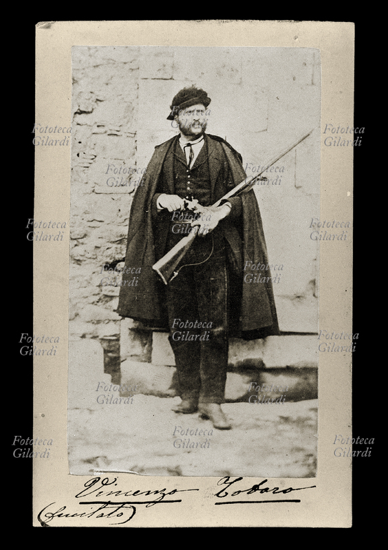 BANDITS photo portrait of the brigand Vito Vincenzo Gianni said Totaro, lieutenant of Carmine Crocco band. Former policeman Bourbon, according to the court records this would be a great ferocity man, who indulged gladly torture and cruelty toward his victims, especially if military or compatriots, sparing women. The note on the photo gives it shot dead, but according to some sources it would be delivered to the General Pallavicini, swapping the death penalty with a life sentence with hard labor. Italy, 1860