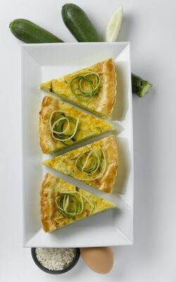 CROSTATA DI RISO STRACCHINO E ZUCCHINE CROSTATA DI RISO STRACCHINO E ZUCCHINE