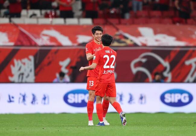 Shanghai Port defenders Jiang Guangtai and Wei Zhen score headers in CSL match
