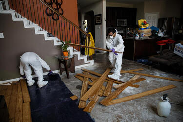 September 2, 2017 - Fort Bend County, Texas, United States: Local residents clear out damaged hardwood floors and carpet in homes damaged in the aftermath of tropical storm Harvey, in the Millwood subdivision of Fort Bend County. (Marcus Yam / Los Angeles Times/Polaris)