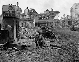 THE STORY of an unsung unit of Second Word War soldiers who stood alongside the infamous ‘Band of Brothers’ as they often fought to the last man to repel Hitler’s last big offensive has been released in a new book detailing their previously little reported struggle. Images show how this unknown band of brothers dug into fox holes in the middle of the snowy Ardennes forest as they wait for the German army to advance, while others see troops stood over the bodies of their fallen comrades. In another picture, a soldier can be seen aiming his rifle at a group of German prisoners, moving them on as they walk with their hands over their heads. The images are from the new book The 110th Holds in the Ardennes by Walter S. Zapotoczny Jr, which tells the tale of how the 110th infantry 28th division held a line through the formidable Ardennes forest against the might of Hitler’s army / Fonthill Media / mediadrumworld.com