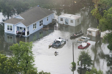 August 2017 - Texas, United States: Hurricane Harvey flooding in Port Arthur, Texas, August 30, 2017. Hurricane Harvey formed in the Gulf of Mexico and made landfall in southeastern Texas, bringing record flooding and destruction to the region. U.S. military assets supported FEMA as well as state and local authorities in rescue and relief efforts. (POLARIS)