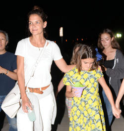 Katie Holmes and Suri Cruise got out to see the sights and taste the delights at the Malibu Fair. Katie went in white, while Suri wore a colorful lemon-print dress, on Sunday, September 3, 2017 Luis/X17online.com