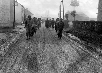 THE STORY of an unsung unit of Second Word War soldiers who stood alongside the infamous ‘Band of Brothers’ as they often fought to the last man to repel Hitler’s last big offensive has been released in a new book detailing their previously little reported struggle. Images show how this unknown band of brothers dug into fox holes in the middle of the snowy Ardennes forest as they wait for the German army to advance, while others see troops stood over the bodies of their fallen comrades. In another picture, a soldier can be seen aiming his rifle at a group of German prisoners, moving them on as they walk with their hands over their heads. The images are from the new book The 110th Holds in the Ardennes by Walter S. Zapotoczny Jr, which tells the tale of how the 110th infantry 28th division held a line through the formidable Ardennes forest against the might of Hitler’s army / Fonthill Media / mediadrumworld.com