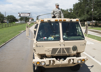August 30, 2017 - Sugarland, Texas, United States: Texas Air National Guardsman, Staff Sgt. Agustin Salazar stands ready to document a civilian recovery mission in a Light Medium Tactical Vehicle (LMTV) during water rescue operations, due to devastating effects caused by Hurricane Harvey's aftermath. Harvey made landfall into the Texas coast last week as a category 4 hurricane. (Polaris)