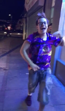 PIC FROM MERCURY PRESS (PICTURED: LEWIS CALEY, 20 LAUGHS IT OFF AS HE LEAVES THE TAKE AWAY IN CLACTON-ON-SEA IN ESSEX) This is the moment a foul-mouthed blonde lady launched herself at a drunken reveller in a shocking takeaway brawl - because he suggested she was in her 60s and threw a chip in her face. Lewis Caley and his friends were getting food from the Quality Diner takeaway in Clacton-on-Sea, Essex, after celebrating his 20th birthday. However an argument ensued when cocky Lewis asked one of the women - estimated to be in her 30s - how old she was and then jokingly suggested she was in her 60s. Footage shows the blonde brand jolly engineer Lewis a c**t and then repeatedly try to snatch his food from him as he sits eating. SEE MERCURY COPY